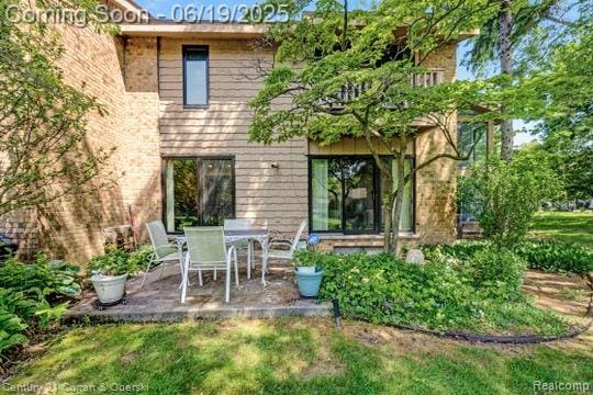 7190 Pebble Park Dr, West Bloomfield, MI 48322 - back of property featuring a patio area