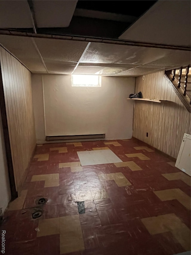 21421 Bournemouth St, Taylor, MI 48225 - finished basement featuring wood walls and tile patterned floors