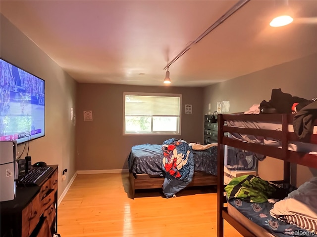 21421 Bournemouth St, Taylor, MI 48225 - bedroom featuring wood finished floors and rail lighting