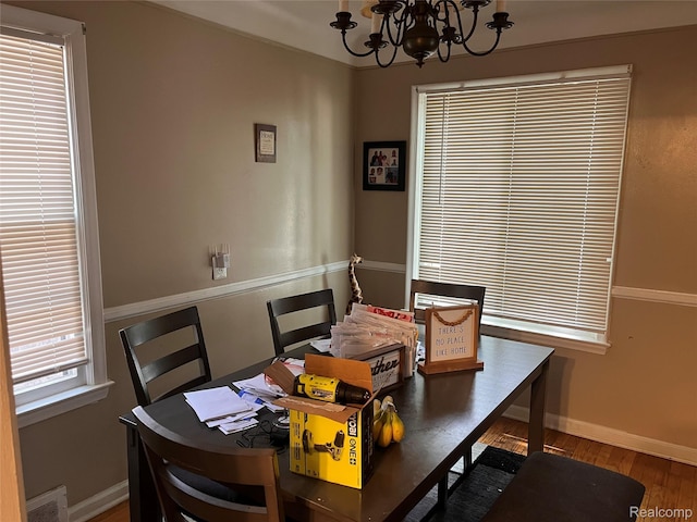 21421 Bournemouth St, Taylor, MI 48225 - dining space with a chandelier and wood finished floors