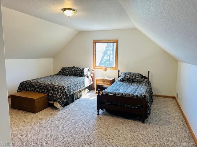 1390 N US-23, East Tawas, MI 48730 - bedroom with light colored carpet, vaulted ceiling, and a textured ceiling