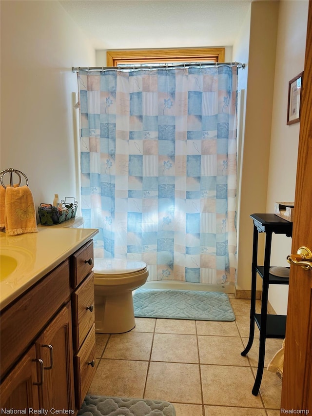 1390 N US-23, East Tawas, MI 48730 - full bath with vanity, tile patterned flooring, and a shower with shower curtain