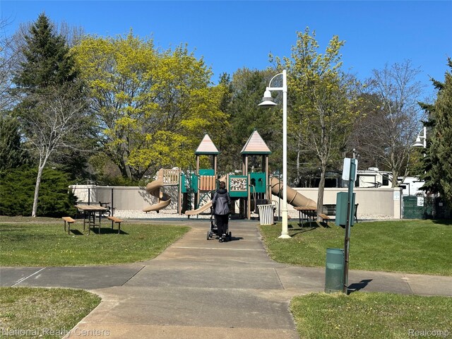 1390 N US-23, East Tawas, MI 48730 - communal playground featuring a yard