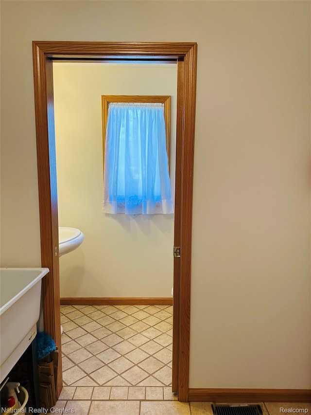 1390 N US-23, East Tawas, MI 48730 - bathroom featuring baseboards
