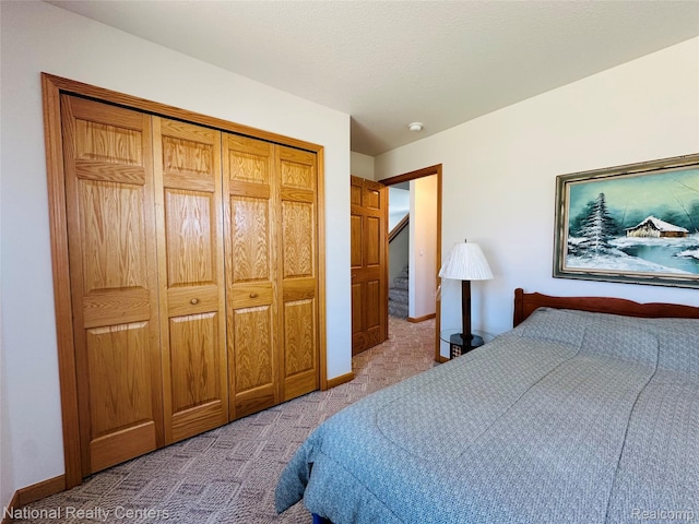 1390 N US-23, East Tawas, MI 48730 - bedroom with carpet and a closet