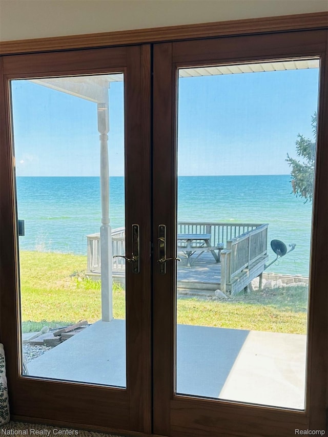 1390 N US-23, East Tawas, MI 48730 - doorway to outside with a water view and french doors