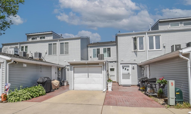 61626 Colony Bay Dr Unit 15, Cassopolis, MI 49031 - rear view of property featuring concrete driveway and a garage