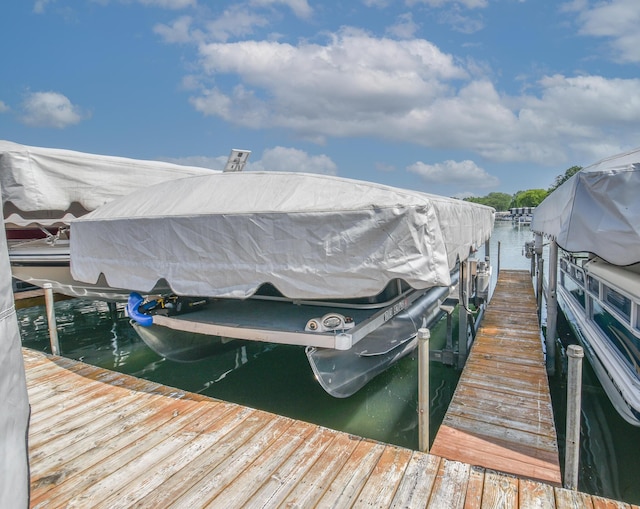 61626 Colony Bay Dr Unit 15, Cassopolis, MI 49031 - dock area featuring boat lift