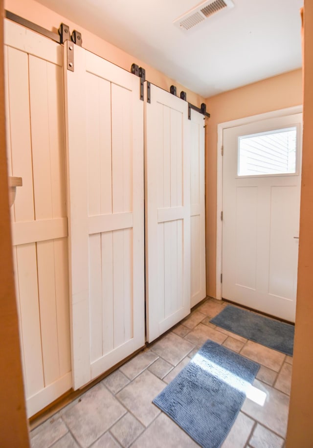 61626 Colony Bay Dr Unit 15, Cassopolis, MI 49031 - foyer entrance featuring a barn door