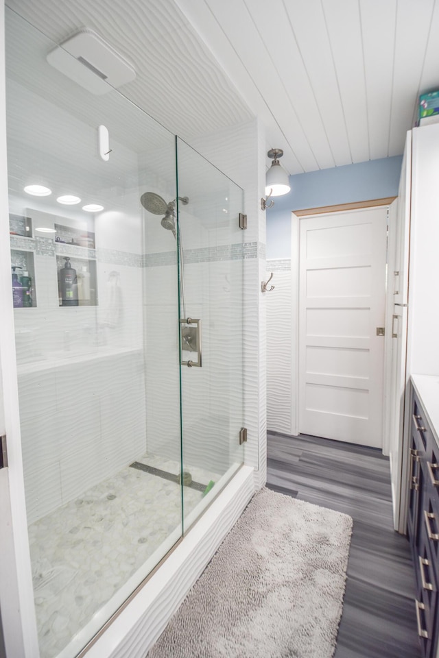 61626 Colony Bay Dr Unit 15, Cassopolis, MI 49031 - full bath featuring a stall shower, wood finished floors, and vanity
