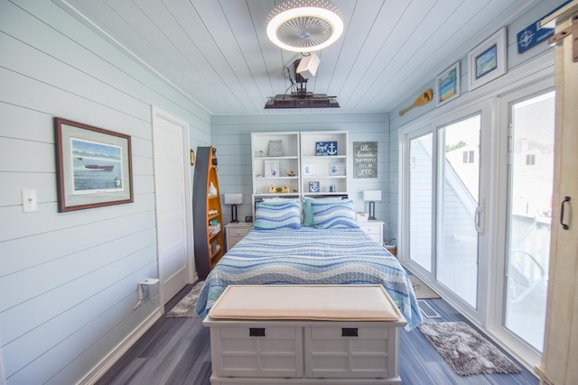 61626 Colony Bay Dr Unit 15, Cassopolis, MI 49031 - bedroom with access to outside, dark wood-style floors, wood walls, and wooden ceiling