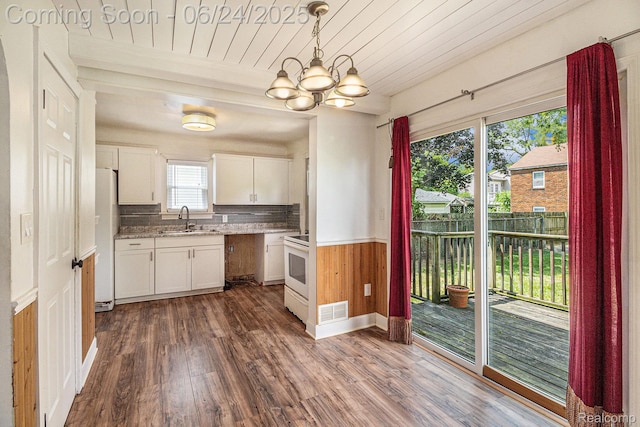 2061 E Boatfield Ave, Burton, MI 48529 - kitchen featuring white appliances, dark wood-style floors, white cabinets, wooden ceiling, and a chandelier