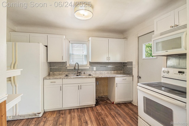 2061 E Boatfield Ave, Burton, MI 48529 - kitchen with white appliances, tasteful backsplash, white cabinets, and dark wood-type flooring