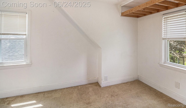 2061 E Boatfield Ave, Burton, MI 48529 - additional living space featuring light carpet and beam ceiling