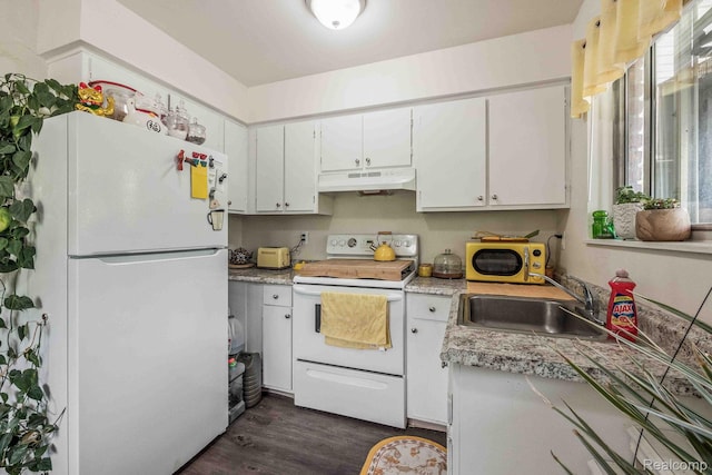 10660 E Holly Rd, Davisburg, MI 48350 - kitchen with white appliances, under cabinet range hood, white cabinetry, dark wood-type flooring, and light countertops