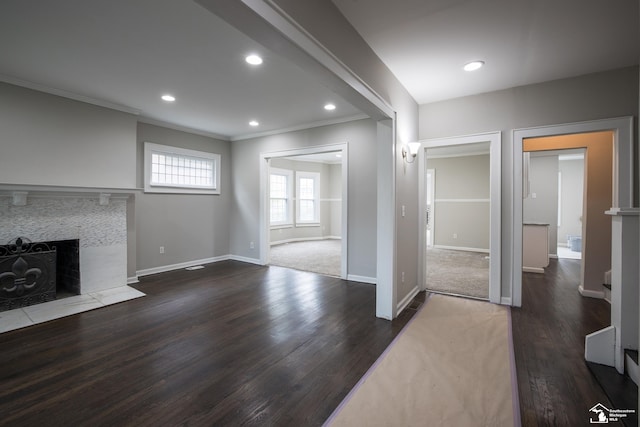 901 Chicago Blvd, Detroit, MI 48202 - unfurnished living room featuring ornamental molding, a tile fireplace, wood finished floors, and recessed lighting