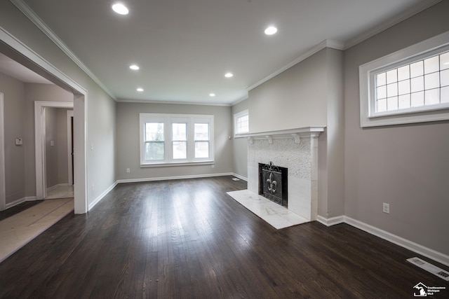 901 Chicago Blvd, Detroit, MI 48202 - unfurnished living room with dark wood finished floors, recessed lighting, crown molding, and a fireplace