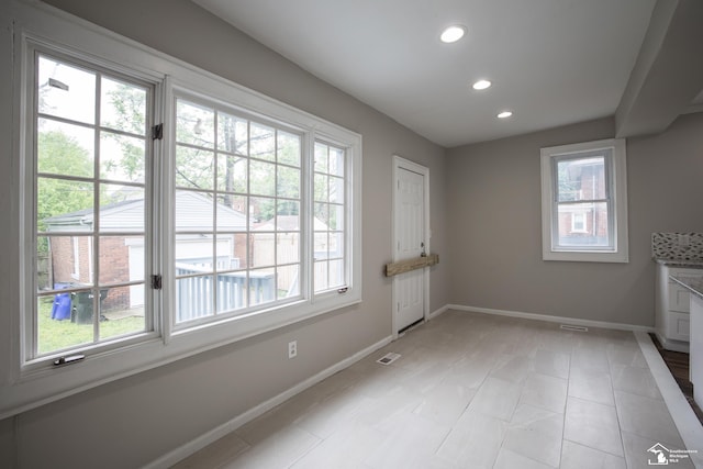 901 Chicago Blvd, Detroit, MI 48202 - doorway featuring healthy amount of natural light, recessed lighting, and light tile patterned flooring