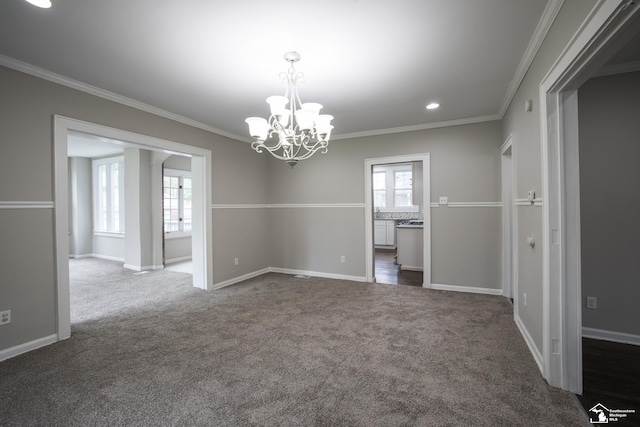 901 Chicago Blvd, Detroit, MI 48202 - unfurnished room with ornamental molding, dark colored carpet, a chandelier, recessed lighting, and arched walkways