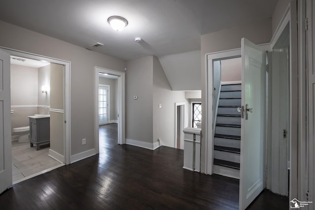 901 Chicago Blvd, Detroit, MI 48202 - corridor with dark wood-style flooring and stairs