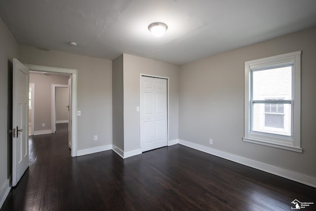 901 Chicago Blvd, Detroit, MI 48202 - unfurnished bedroom featuring dark wood finished floors and a closet