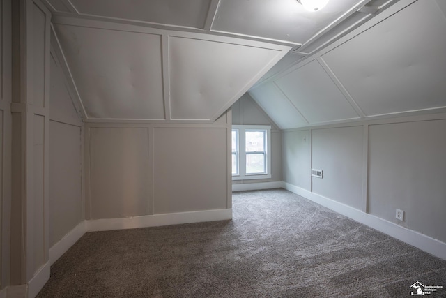 901 Chicago Blvd, Detroit, MI 48202 - additional living space with carpet, vaulted ceiling, and a decorative wall