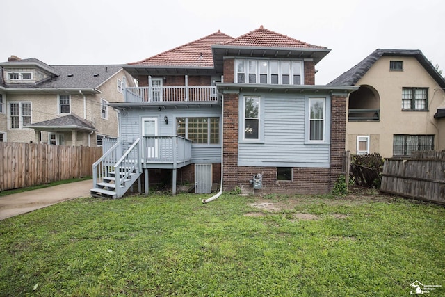 901 Chicago Blvd, Detroit, MI 48202 - rear view of house featuring a balcony and a fenced backyard