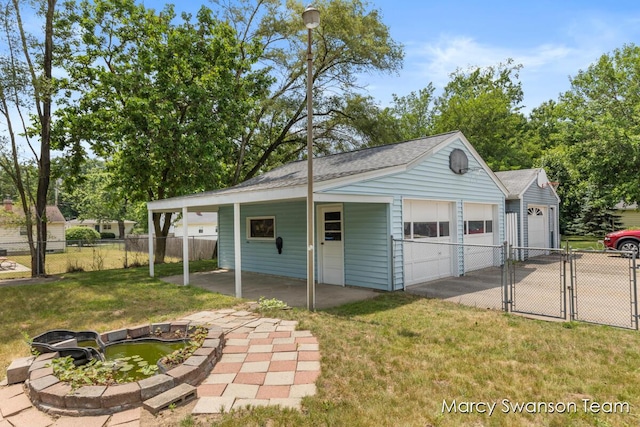 1372 Brookmark St SE, Kentwood, MI 49508 - detached garage with a gate