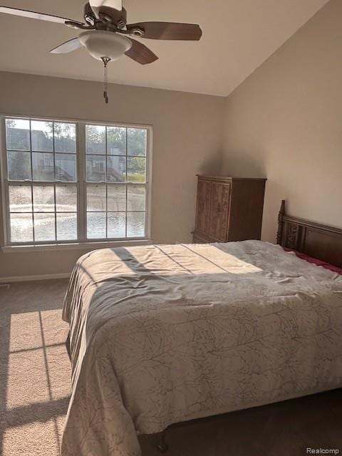 5959 Augusta Ln Unit 20, Grand Blanc, MI 48439 - carpeted bedroom featuring a ceiling fan and baseboards