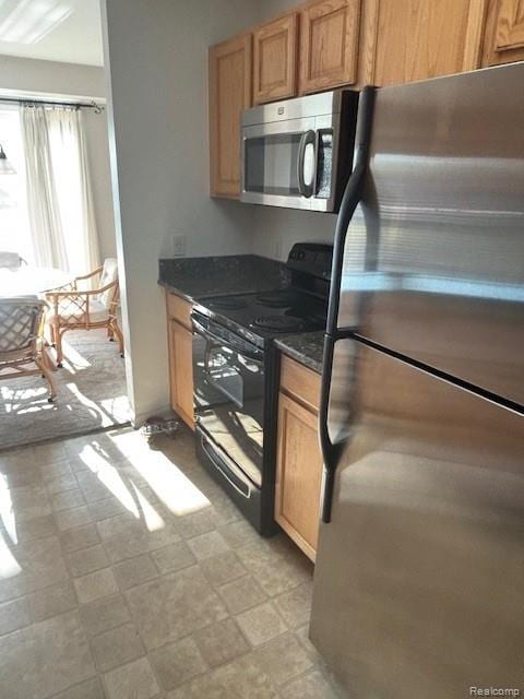 5959 Augusta Ln Unit 20, Grand Blanc, MI 48439 - kitchen with stainless steel appliances and light flooring