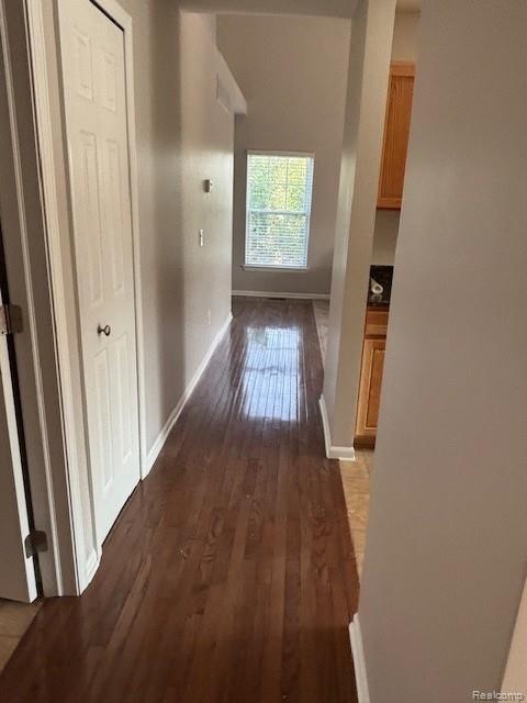 5959 Augusta Ln Unit 20, Grand Blanc, MI 48439 - corridor with hardwood / wood-style flooring and baseboards