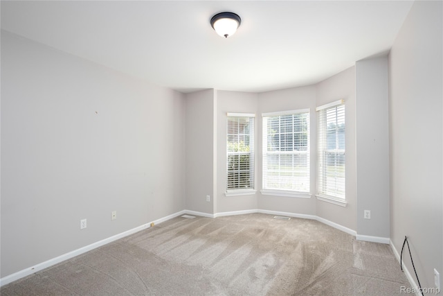 5959 Augusta Ln Unit 20, Grand Blanc, MI 48439 - empty room with carpet flooring and baseboards