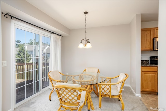 5959 Augusta Ln Unit 20, Grand Blanc, MI 48439 - dining room featuring light carpet and a chandelier