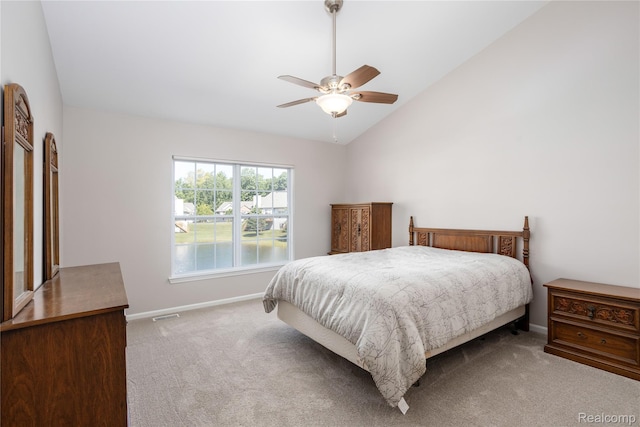 5959 Augusta Ln Unit 20, Grand Blanc, MI 48439 - carpeted bedroom with lofted ceiling and ceiling fan