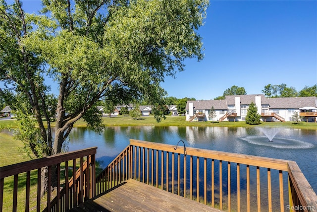 5959 Augusta Ln Unit 20, Grand Blanc, MI 48439 - wooden deck featuring a water view and a residential view