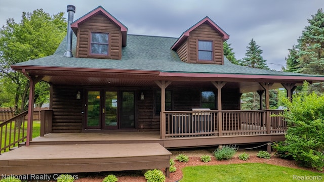 1471 Eldon Ct, Gladwin, MI 48624 - view of front of property with french doors and roof with shingles