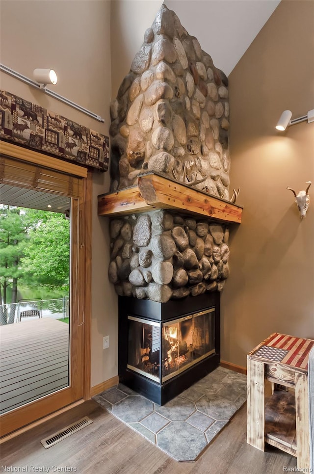 1471 Eldon Ct, Gladwin, MI 48624 - detailed view of a fireplace and wood finished floors