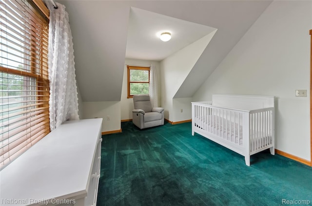 1471 Eldon Ct, Gladwin, MI 48624 - carpeted bedroom with a crib and vaulted ceiling