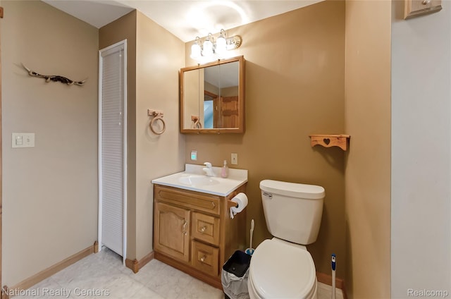 1471 Eldon Ct, Gladwin, MI 48624 - bathroom featuring vanity and a closet