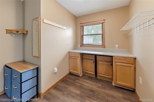 1471 Eldon Ct, Gladwin, MI 48624 - bar with dark wood finished floors and baseboards