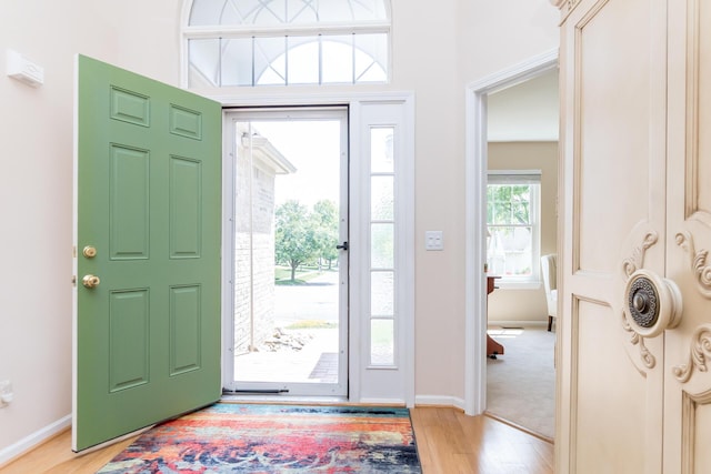 3105 Earlmoore Ln, Ann Arbor, MI 48105 - entrance foyer with light wood-type flooring and baseboards