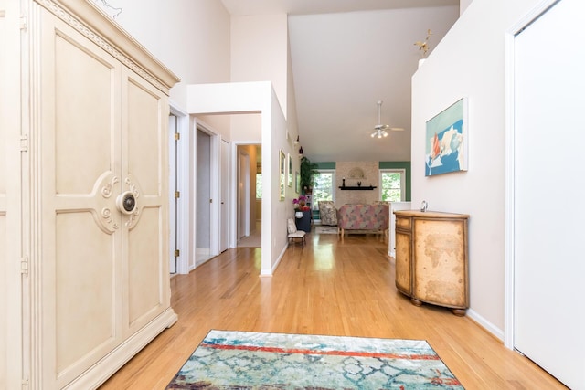 3105 Earlmoore Ln, Ann Arbor, MI 48105 - entrance foyer featuring ceiling fan, light wood-style floors, and high vaulted ceiling