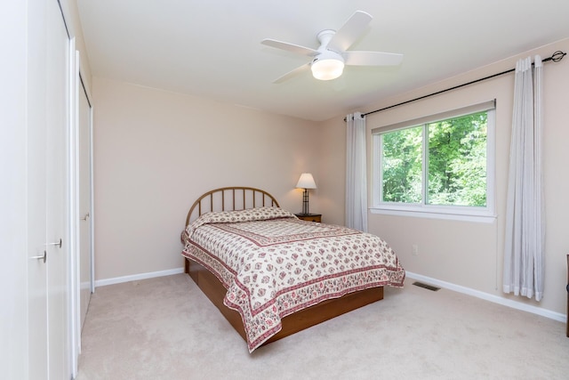 3105 Earlmoore Ln, Ann Arbor, MI 48105 - bedroom with carpet floors, a closet, and a ceiling fan
