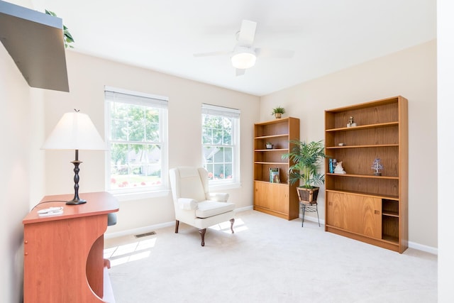 3105 Earlmoore Ln, Ann Arbor, MI 48105 - living area with light colored carpet and a ceiling fan