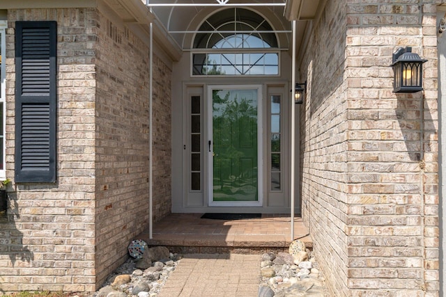 3105 Earlmoore Ln, Ann Arbor, MI 48105 - doorway to property with brick siding
