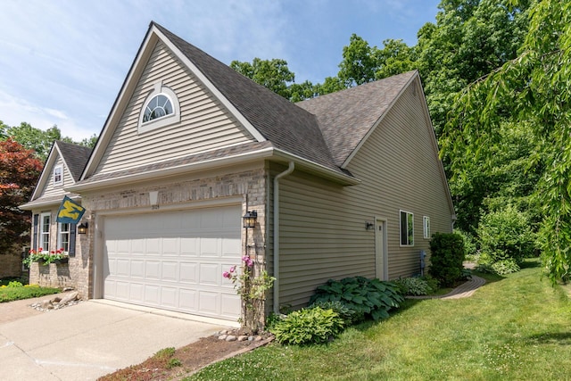 3105 Earlmoore Ln, Ann Arbor, MI 48105 - view of property exterior with a shingled roof, driveway, a lawn, and a garage