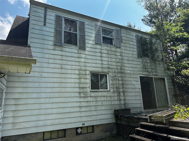 12910 Wilbur Rd, Clinton, MI 49236 - view of side of property with roof with shingles