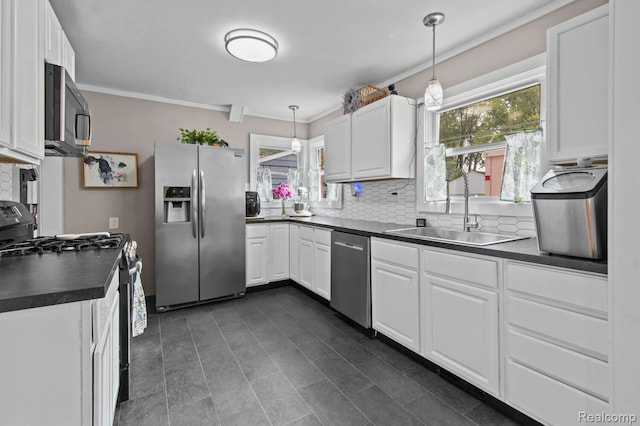 29948 Hathaway St, Livonia, MI 48150 - kitchen with appliances with stainless steel finishes, dark countertops, backsplash, white cabinetry, and crown molding