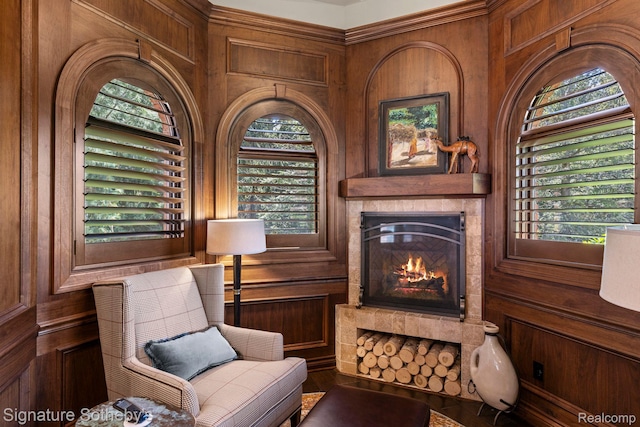 597 Yarboro Dr, Bloomfield Hills, MI 48304 - living area with wood walls and a lit fireplace