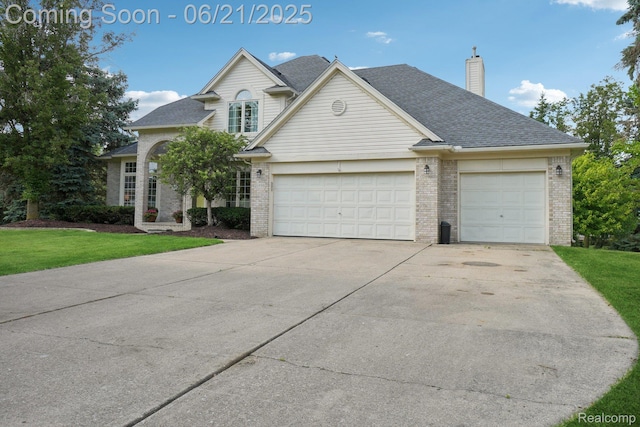 21898 Aspen Ct, Farmington Hills, MI 48335 - traditional home featuring brick siding, an attached garage, driveway, and a chimney